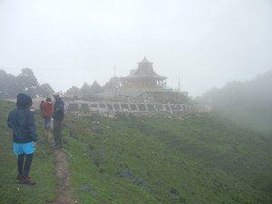 The temple appears out of the fog!