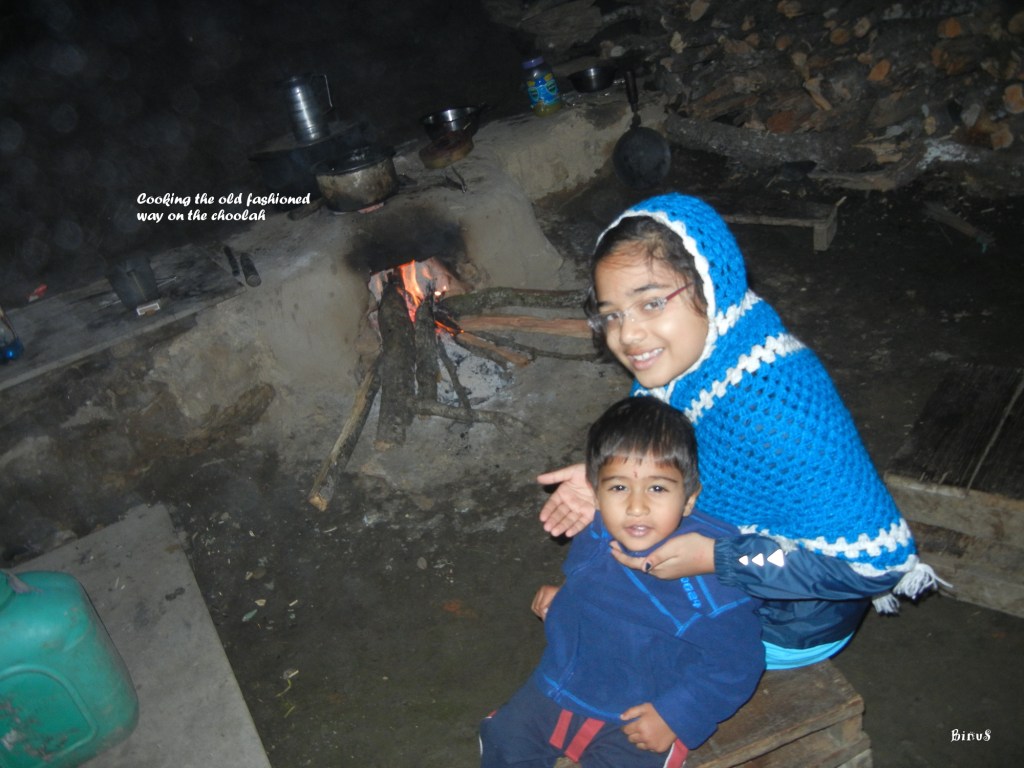 Warming Up By The Choolah. That was the dal (lentil) being cooked.
